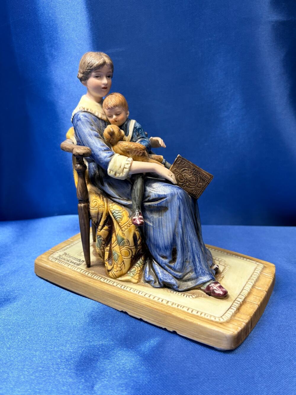 Norman Rockwell Bedtime Mom Reading Book To Baby Holding Teddy Bear